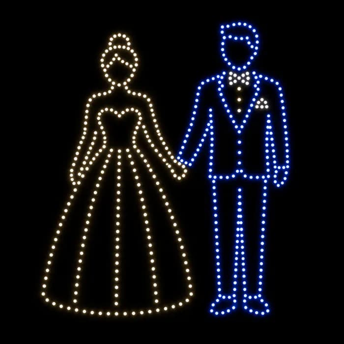 Bride and groom holding hands wedding drone show figure made from glowing dots